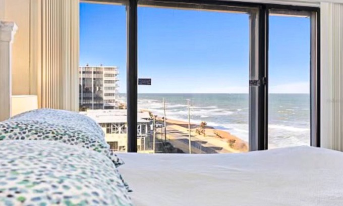 Flagler Beach Condo | Ocean-view condo with balcony, pool, tennis, & shuffleboard - near beach/golf