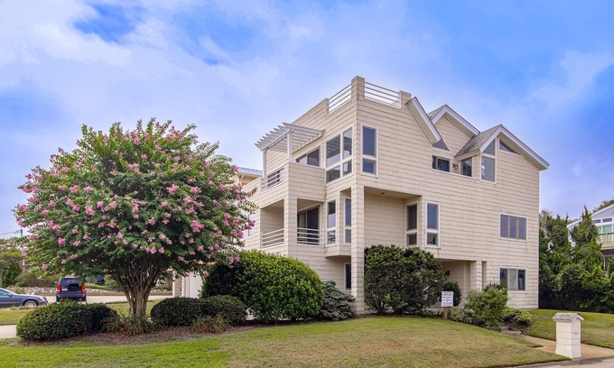 Croatan Beach House | Ocean-view home that is within a 2 minute walk to the beach w/rooftop deck