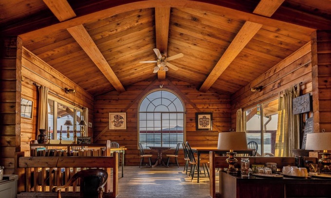 Alert Bay Bed & Breakfast | Ocean View Log Lodge with queen bed. Hot breakfast included.