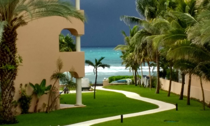 Puerto Aventuras Condo | Ocean view luxury condo with a outstanding deck
