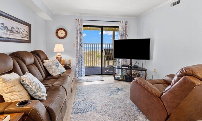 Windy Hill Condo | Oceanfront 2BR condo with balcony, pool, full kitchen & beach access-perfect family getaway!