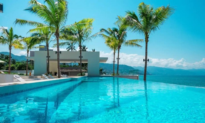 Olimpica Condo | Oceanfront 3 bed luxury condo with great views, full kitchen, & fast Wi-Fi