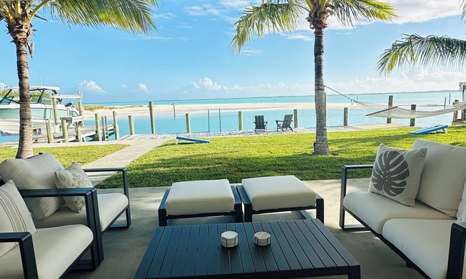 Treasure Cay House | Oceanfront 5-bedroom 3-bath house with 50' Dock & optional 6 seater golf cart