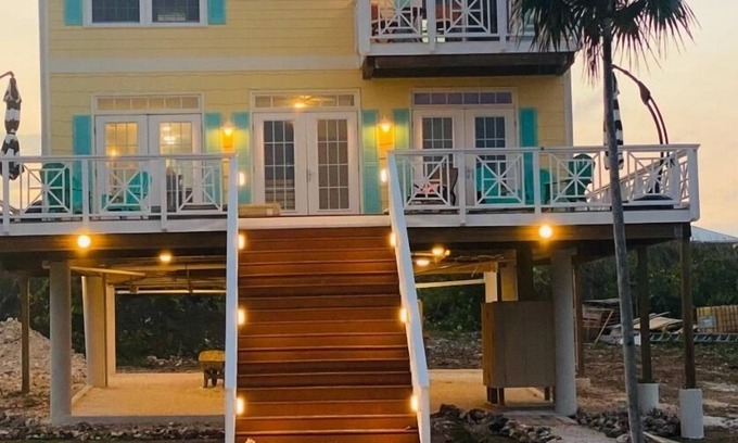 Green Turtle Cay House | Oceanfront brand new home with large deck and BBQ. Steps away from sandy beach!