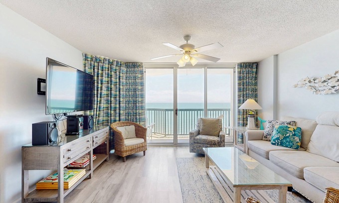 Ocean Drive Condo | Oceanfront condo with pool, hot tub, private balcony & close to golf