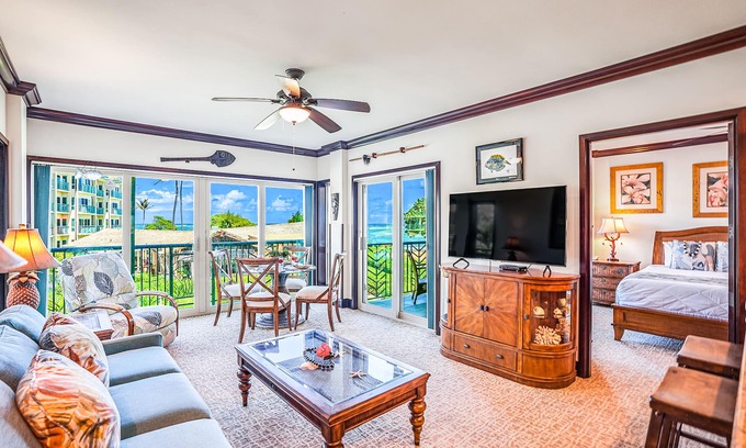 Wailua Condo | Oceanfront luxury steps from the beach with pool, hot tub, balcony & central AC