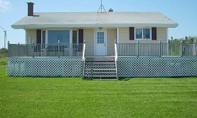 Elmira Cottage | Oceanfront - Sea Seekers - Bed by the Ocean