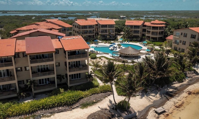 San Pedro Resort | Oceanfront Tranquility: 3rd Floor Condo w/Stunning Reef Views, Resort Pools