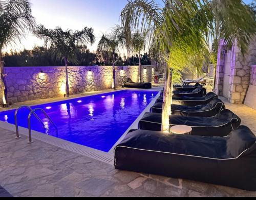 Petaloudes Apartment | Odyssea Seaside Apartment with Sea View and Pool