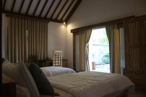 Rote Island Bed & Breakfast | Oemau Bungalow