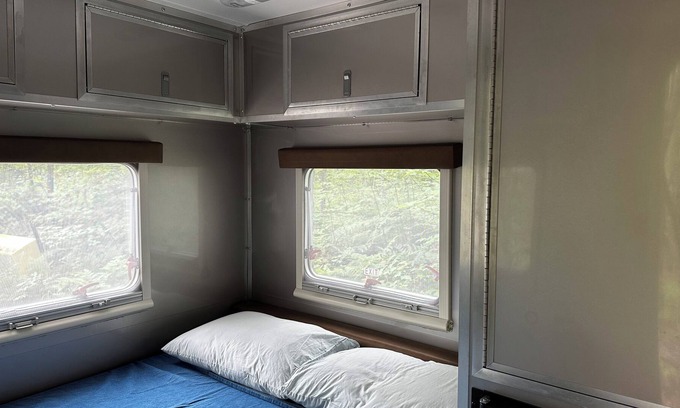 Houghton House | Off-grid Minimalist Camper for Two. Peaceful private forest in the Keweenaw.