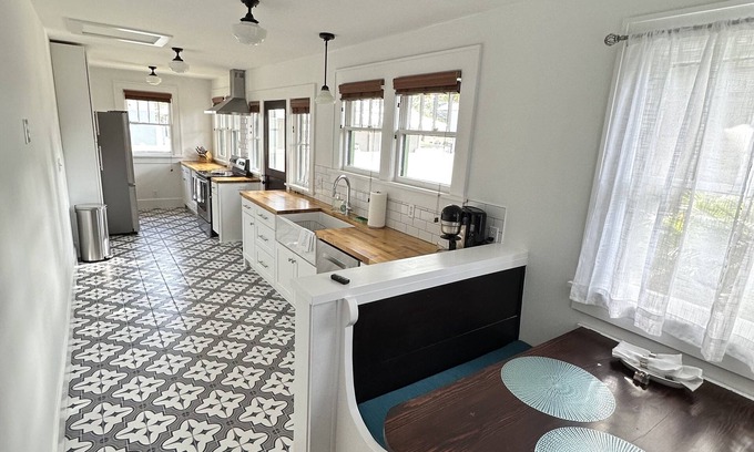 St. Petersburg - Clearwater House | Old NE bungalow, lower level near Black Crow. Walk or Bike with ease to downtown