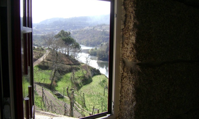 Amarante House | Old stone house with swimming pool and river.