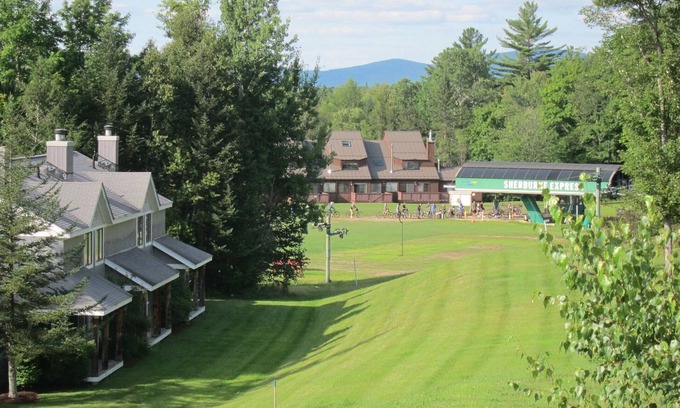 East Burke Condo | On Burke Mountain, bike in bike out. Pool, Hot tub, Gym access at the hotel.