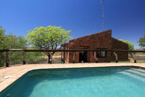 Okaukuejo Cabin | Onduri Lodge