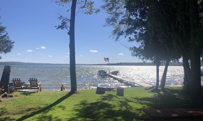 Traverse City Cabin | One-bedroom cabin on Lake Leelanau. Sunset view. Pet considered.