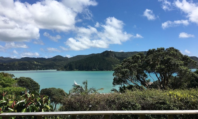 Whangaroa Ski Chalet | One Bedroom Unit with bathroom and small living area with kitchenette.