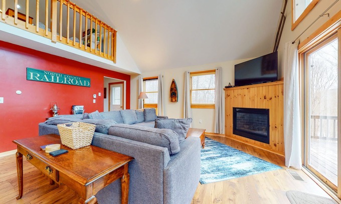 Eidelweiss Village House | Open concept home close to the beach with gas fireplace and deck
