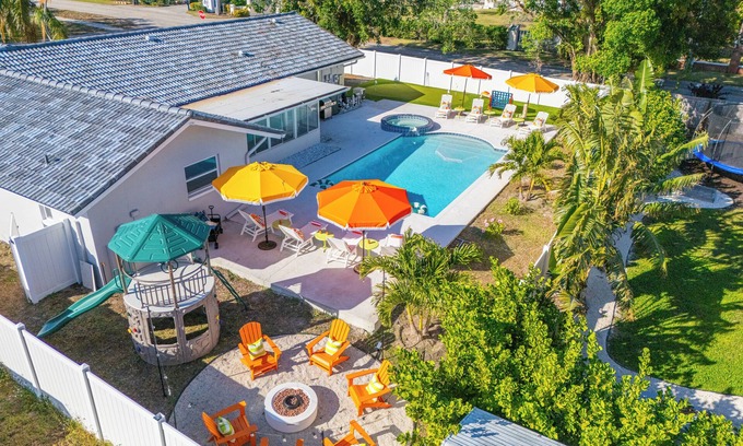 Palma Sola House | Orange Blossom~6mi to beach~Htd Pool+Hot Tub~Gameroom~Gym~Fire Pit~Playground