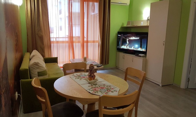 Sunny Beach Apartment | Orange flower apartment
