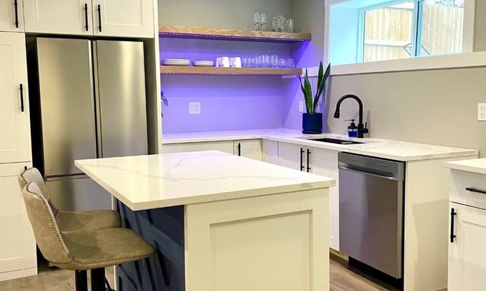 North Glenmore Bed & Breakfast | Orchard Oasis - Spacious with Modern Comforts, Heated Floors, 65" TV