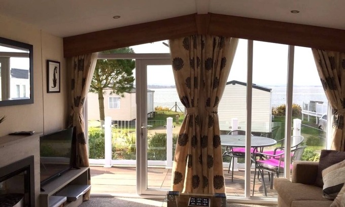 Hamworthy House | Orchid - dog friendly with sea view on Rockley Park, Poole