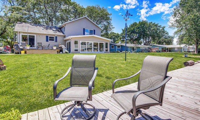 Oshkosh House | Oshkosh Canal-Front Home w/Sunroom & Watercraft!