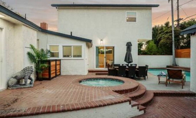 The Plaza House | Ostrom · Modern heated pool&spa + 5 mi to beach
