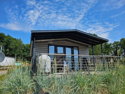 Gronenberg House | Ostseecamp Lübecker Bucht Ferienhaus "Beachhouse" mit kostenlosen Saunazugang