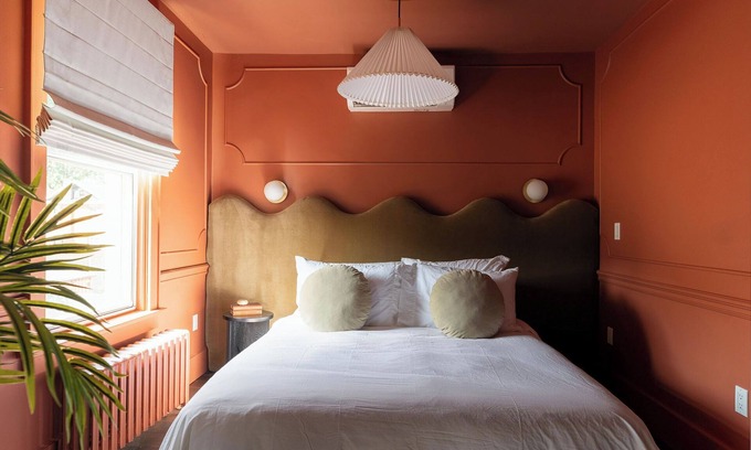 Stratford Hotel | Our spiciest suite—flat 6 is dipped in a hot red hue.
