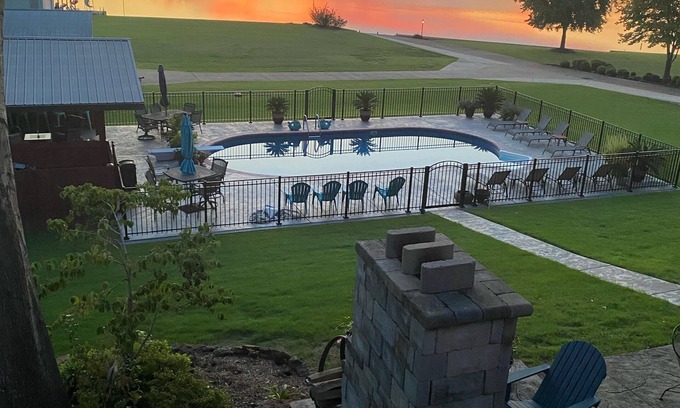 Huron Apartment | Outdoor family time on the patio, at the pool-pool house, or on the boat dock!