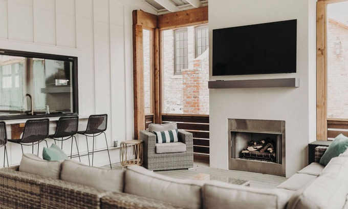 Carlton Landing House | Outdoor perfection: 3 porches with park views, turf backyard, easy walk to pool