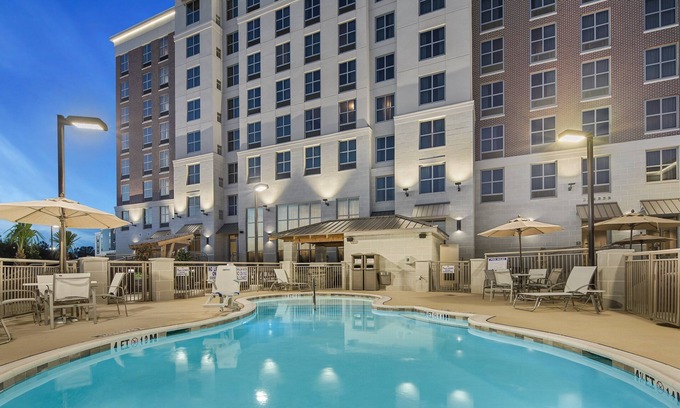 Florence Condo | Outdoor Pool + Business Center, Free Breakfast | Fully Equipped Suite
