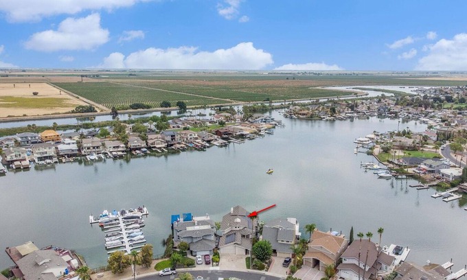Discovery Bay House | Over the water experience in Biggest Bay/w Water Toys, Beach nearby. Waterfront