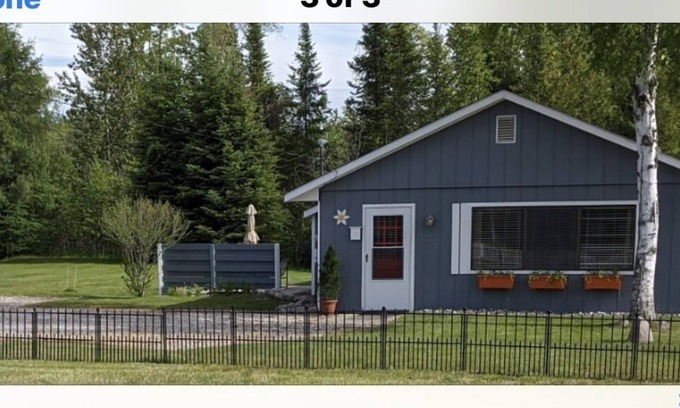 Rapid City Cottage | Overlooking Torch Lake sandbar