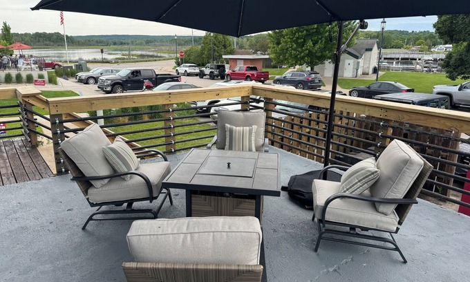 East Jordan House | Overlooks the Marina in East Jordan’s South Arm. Located next door to MOM’s Bar