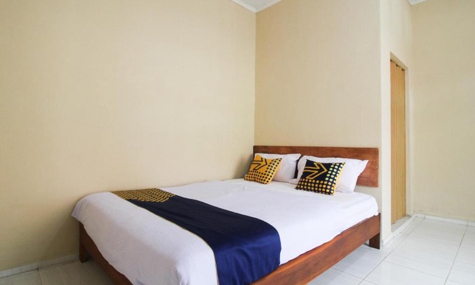 Mandau Hotel | OYO 2592 Homestay Bunda Puja