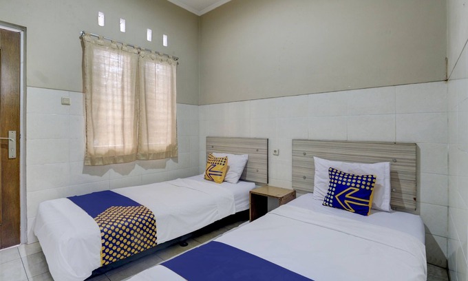 Muncar Hotel | OYO Life 90159 Puri Asoka Guest House