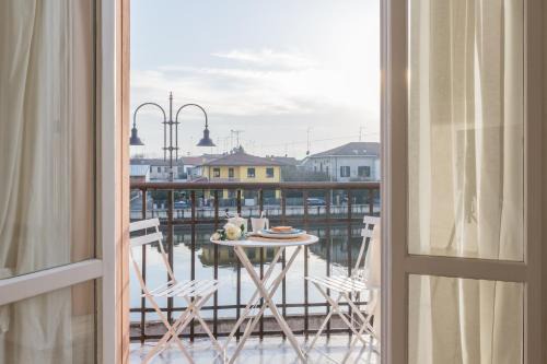 Codigoro Apartment | Palazzo Spada - Appartamento con balcone vista fiume in centro