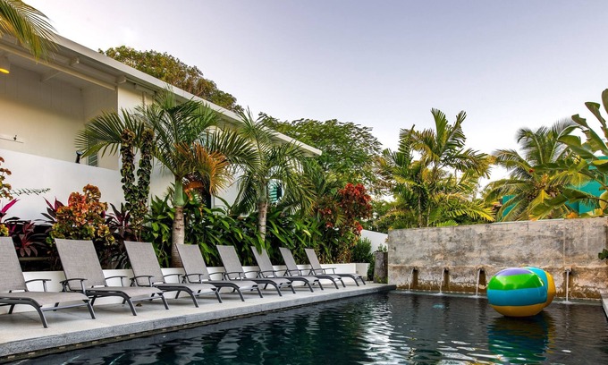 Bravos de Boston Condo | Palm Cottages - Entire Compound - Tropical Oasis