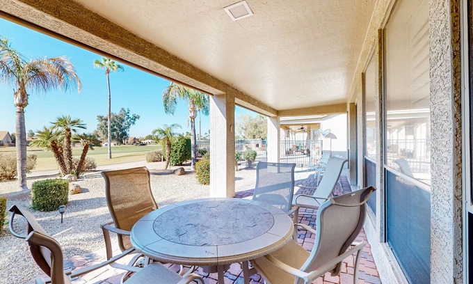 Oakwood House | Palm-lined home with pool access, grill, office & golf course views