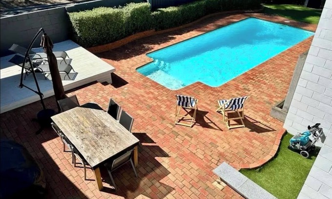 Golden Square House | Palm Springs Resort Style Spacious living + Pool & Indoor Wood Fire Place!