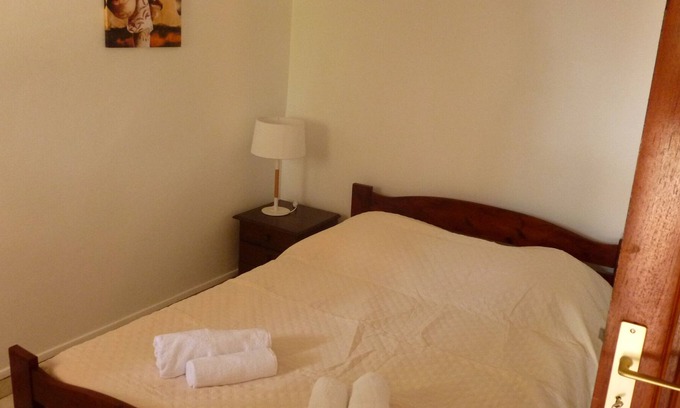 L'Houezel Apartment | Palm tree, 2 comfortable bedrooms, swimming pool at l houezel