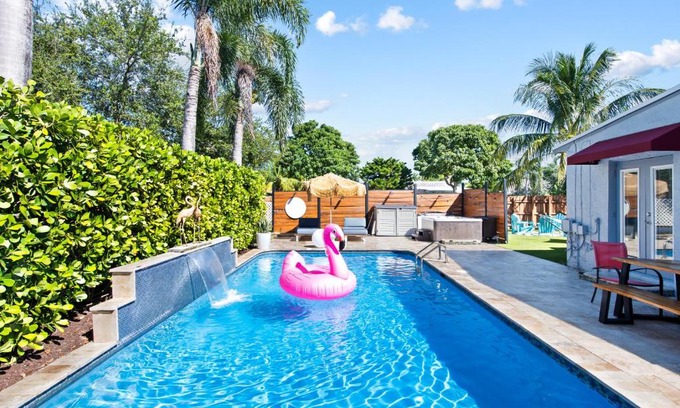 Poinsettia Heights Villa | Palms Retreat! Giant Heated Pool-HotTub-FirePit-5Min2Beach-Pets-EV Chgr