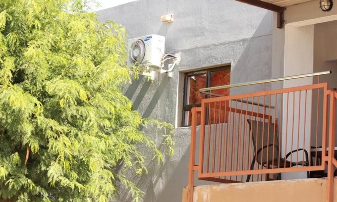 Windhoek House | Pandeinge - Family Room with Bathroom