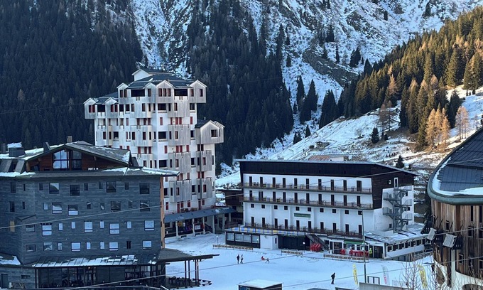 Foppolo Apartment | Panorama of Foppolo, the mountains and the slopes in the morning sun
