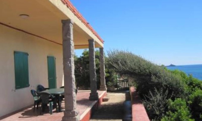 Porto Alabe Villa | Panoramic sea front housewith garden and beach directly below