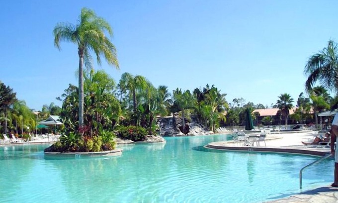 Naples Condo | PARADISE FOUND! LAKEFRONT FIRST FLOOR CONDO IN TROPICAL FALLING WATERS