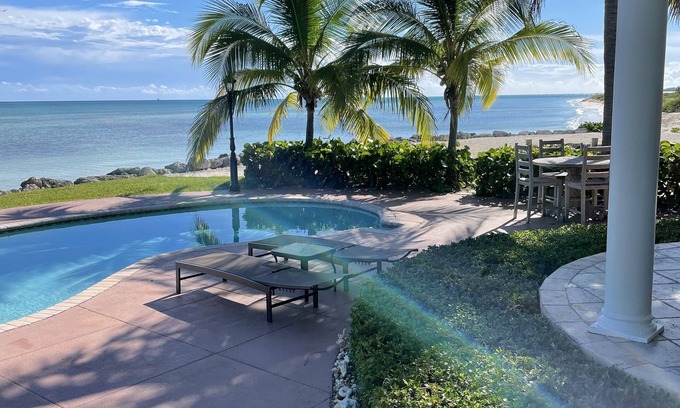 Freeport House | Paradise is Due South! One level main house and 2 story complete guest house.