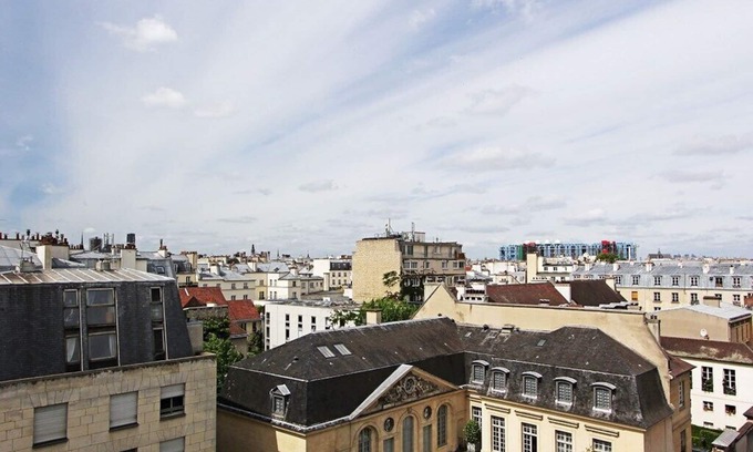 Archives Apartment | Parisian Stylish & Modern - 1BR in Marais, Rooftop Views
